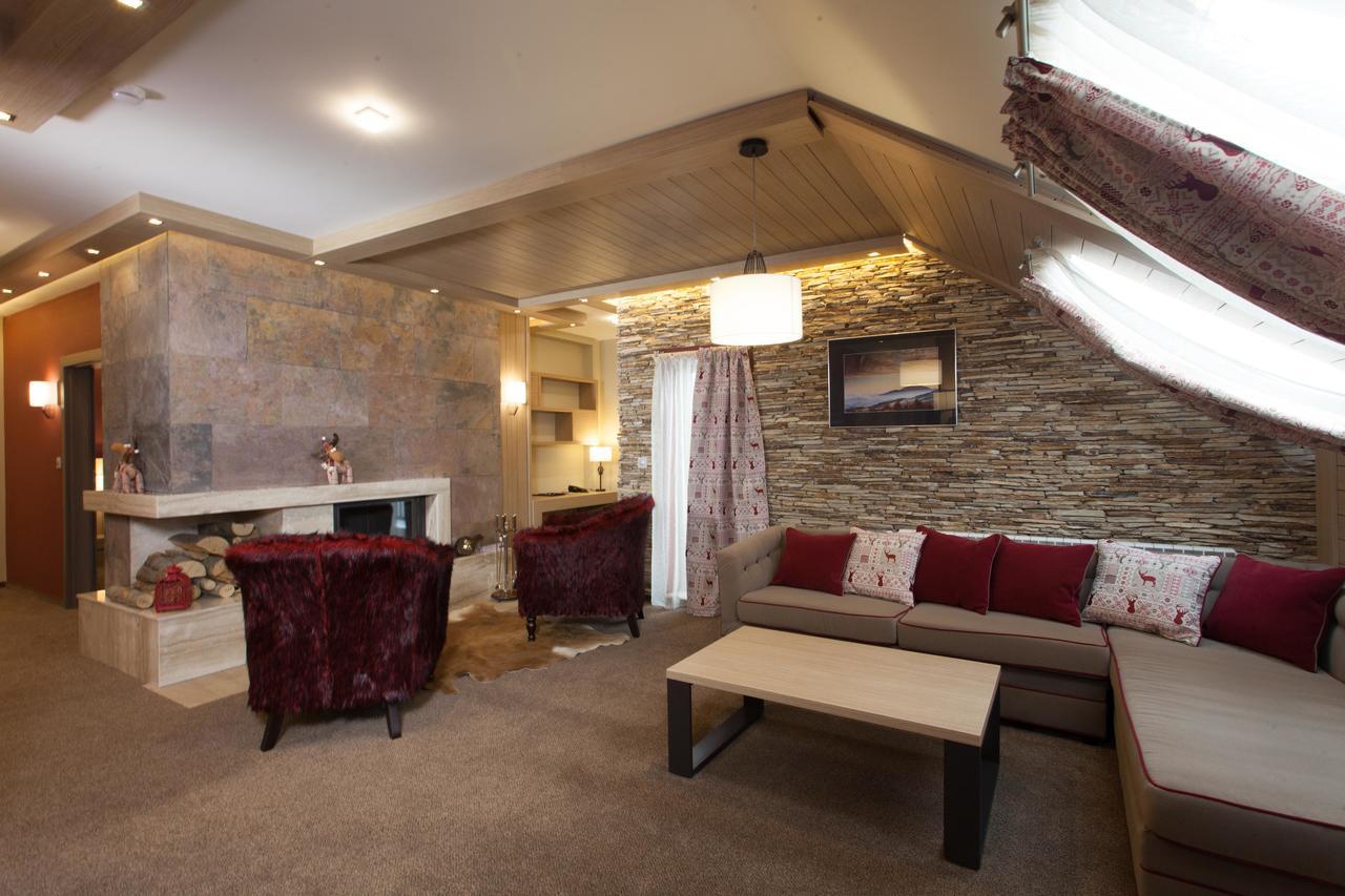 Amira Boutique Hotel Bansko Bagian luar foto Interior of a suite at the hotel